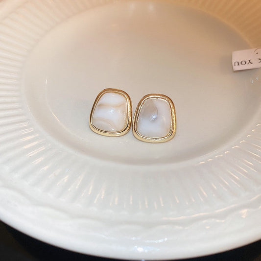Pearl White Golden Glow Studs